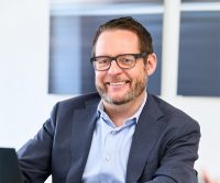 Portrait von Unternehmensberater Wolfgang Schuster